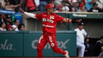 Mexico's Diablos Rojos Franklin Barreto scores a run during the seventh inning of the first exhibition baseball game against New York Yankees at the Alfredo Harp Helu stadium in Mexico City on March 24, 2024. (Photo by ALFREDO ESTRELLA / AFP)