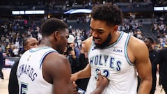 DENVER, COLORADO - MAY 19: Karl-Anthony Towns #32 and Anthony Edwards #5 of the Minnesota Timberwolves react after winning Game Seven of the Western Conference Second Round Playoffs against the Denver Nuggets at Ball Arena on May 19, 2024 in Denver, Colorado. NOTE TO USER: User expressly acknowledges and agrees that, by downloading and or using this photograph, User is consenting to the terms and conditions of the Getty Images License Agreement.   C. Morgan Engel/Getty Images/AFP (Photo by C. Morgan Engel / GETTY IMAGES NORTH AMERICA / Getty Images via AFP)