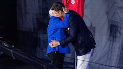 CEO of the New England Patriots Robert Kraft (L) embraces former New England Patriots quarterback Tom Brady before giving him his red Patriots Hall of Fame induction jacket during the 2024 induction ceremony at Gillette Stadium in Foxborough, Massachusetts, on June 12, 2024. Tom Brady is the 35th person to be inducted into the Patriots Hall of Fame. (Photo by Joseph Prezioso / AFP)