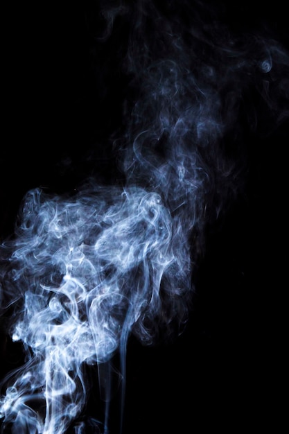 Foto grátis sobreposição de fumaça branca sobre fundo preto