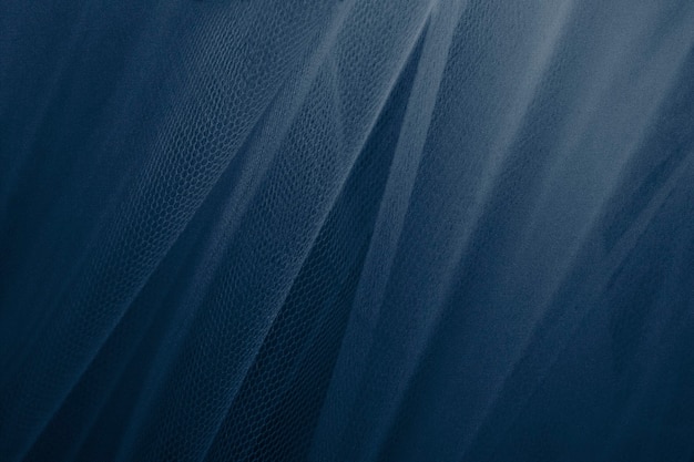 Kostenloses Foto strukturierter hintergrund mit blauem tüllvorhang
