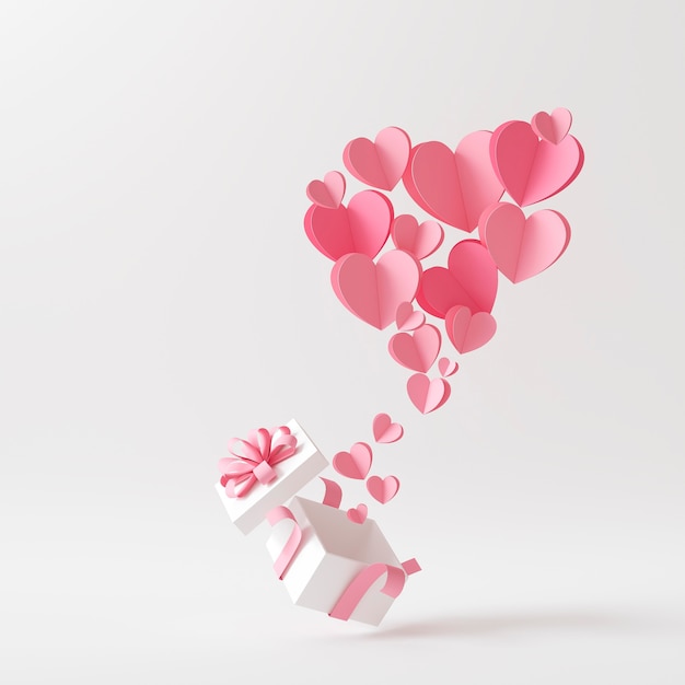 Kostenloses Foto vorderansicht von vielen rosa herzen, die aus einer geschenkbox kommen
