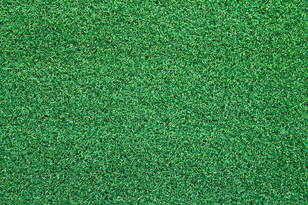 La textura artificial de la hierba verde se puede utilizar como fondo