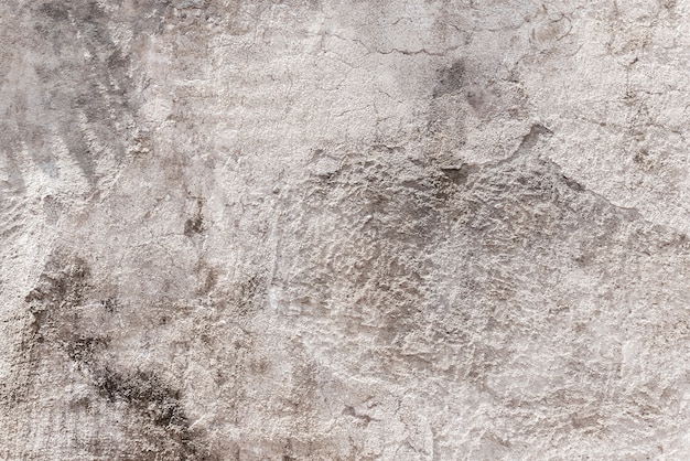 Textura do muro de cimento marrom velho para o fundo abstrato.