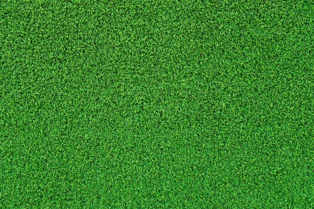 Foto textura verde del fondo de la superficie de la hierba artificial.