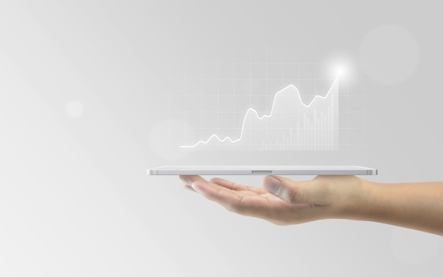 Foto análisis de tabletas gráfico de negocios concepto de diagrama de datos antecedentes financieros con gráfico de acciones de crecimiento pantalla comercial o interfaz de ganancias de marketing de éxito y gráfico de información de barra simple digital de economía financiera