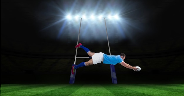 Foto composición de jugador de rugby masculino sosteniendo la bola de buceo en campo de rugby