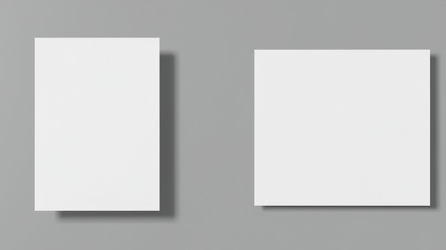 Dos lienzos blancos en blanco sobre un fondo gris.