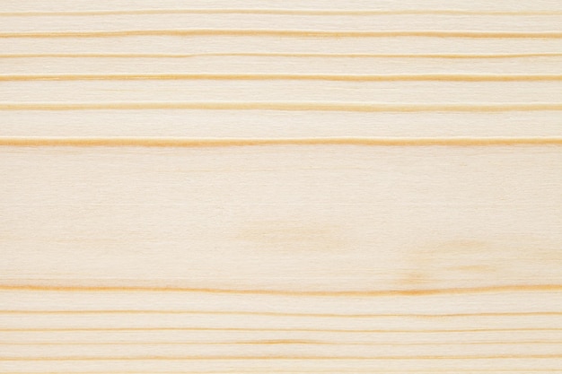 Foto la estructura de primer plano de las fibras de la superficie de madera procesada con rayas horizontales es de fondo oscuro