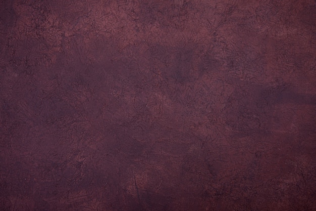 Foto fondo marrón oscuro - pared con textura grunge para su diseño.