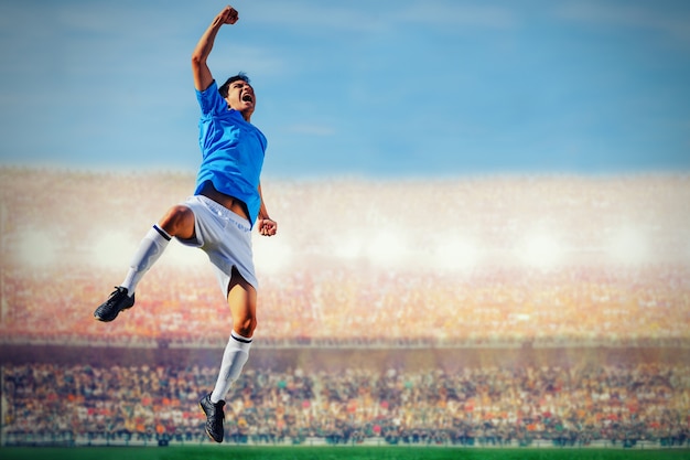 Foto jugador de fútbol soccer en el concepto de equipo azul celebrando el gol en el estadio durante el partido