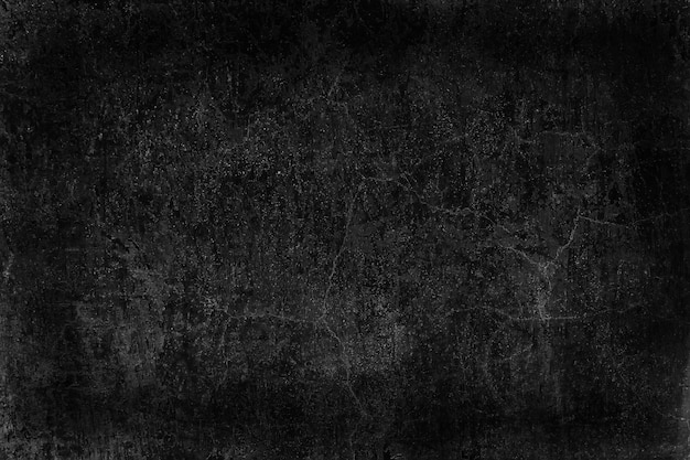 Foto schwarze alte mauer rissiger betonhintergrund / abstrakte schwarze textur, alter hintergrund der weinlese