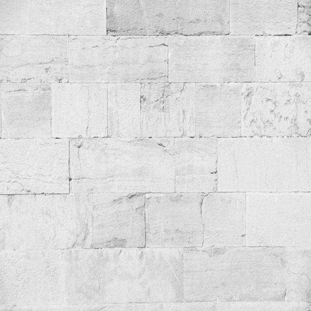 Foto gratuita gris de la pared hecha de piedras