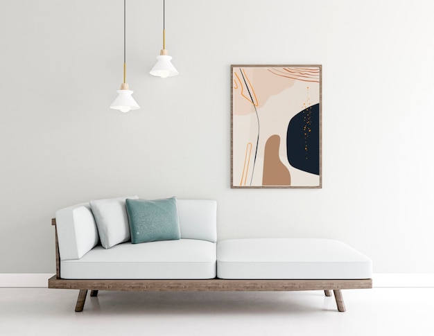 Foto gratuita diseño de interiores con marcos de fotos y sofá blanco.