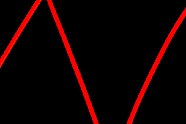 Foto gratuita luz de neón roja del zigzag en fondo negro