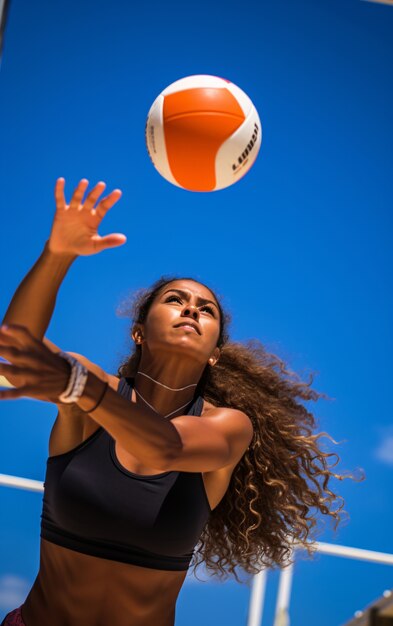 Voleibol con jugadora y pelota.