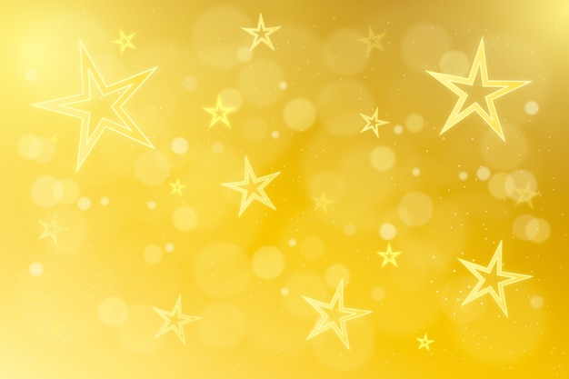 Бесплатное векторное изображение Градиентный желтый звездный фон