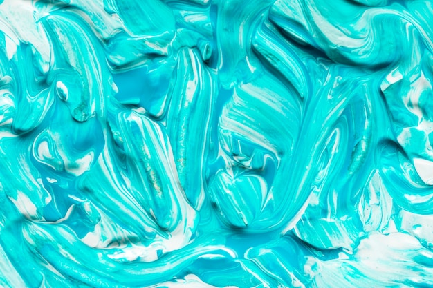 Бесплатное фото Вид сверху творческой синей краской на поверхности