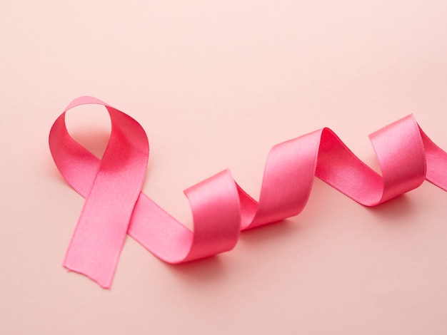 Free photo above view pink ribbon cancer concept