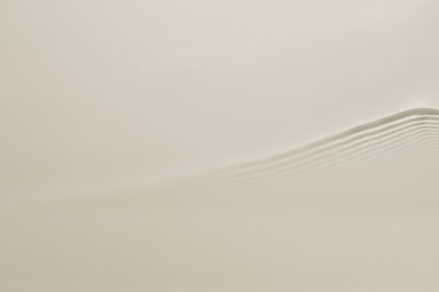 Бесплатное фото Водная волна текстуры фона, коричневый дизайн