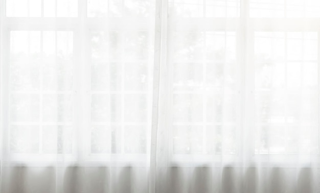 Free photo white curtain wavy with transparent curtain on window a pattern background