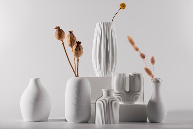 Free photo white modern vases arrangement
