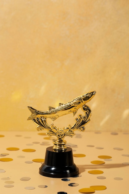 Бесплатное фото Концепция победителя с золотой рыбкой