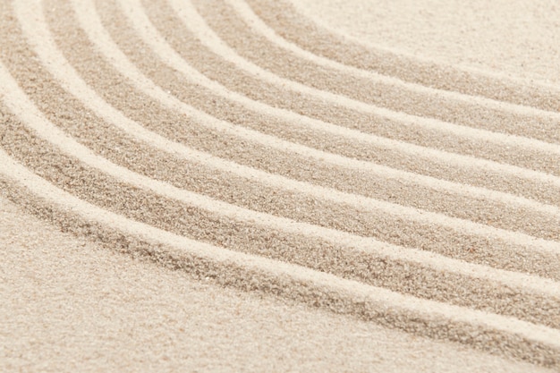 Foto gratuita fondo strutturato dell'onda della sabbia di zen nel concetto di consapevolezza