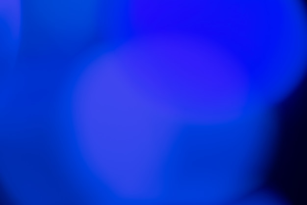 Бесплатное фото Абстрактный размытый фон с синими огнями