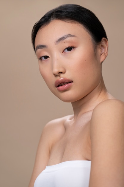 Free photo beautiful asian woman with clear skin