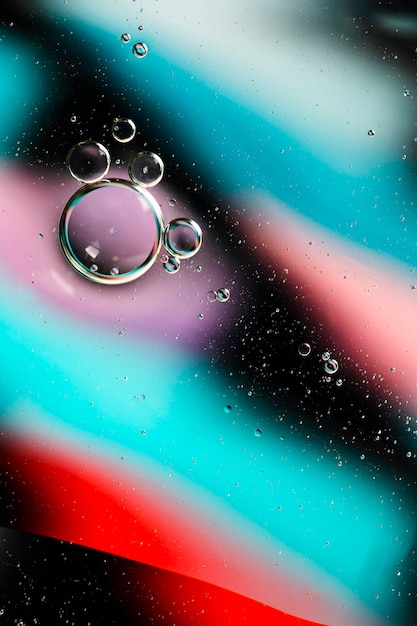 Foto gratuita sfondo colorato con piccole bolle trasparenti carine