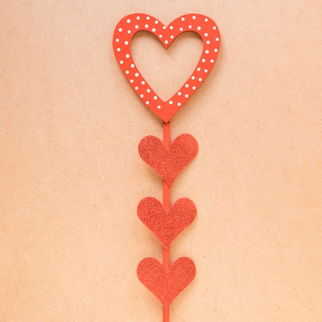 Free photo decorative red hearts on stick