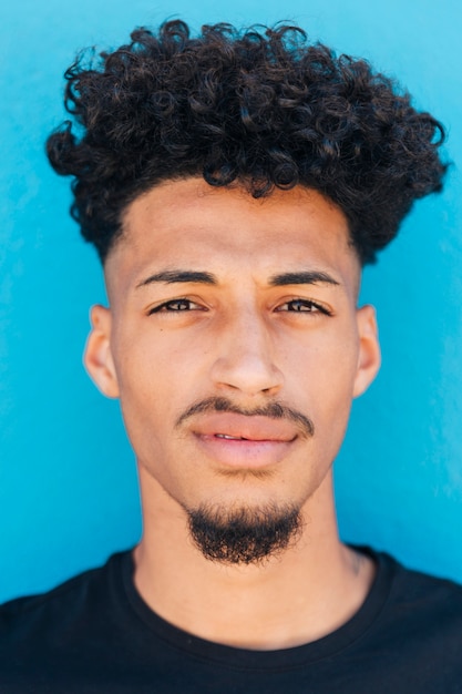 Free photo face of ethnic man with afro