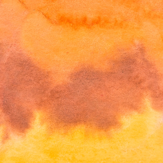 Free photo full frame of abstract light orange watercolor background