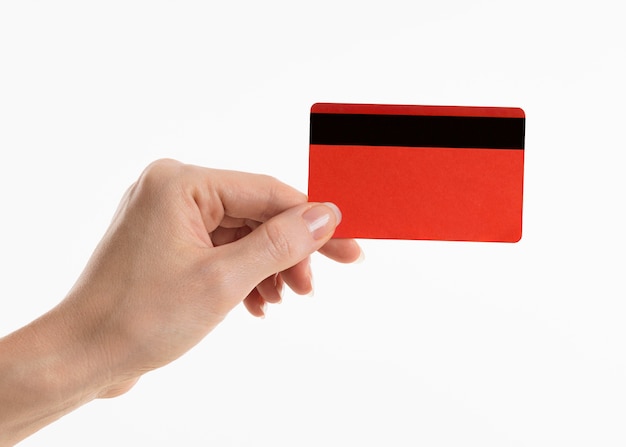 Рука, держащая кредитную карту