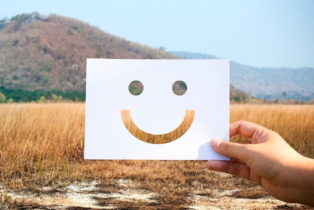 Free photo happines cheerful perforated paper smiley face
