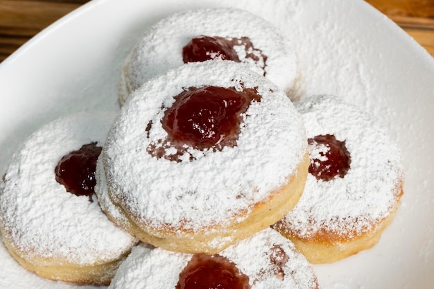 Free photo happy hanukkah holiday high view doughnuts with jam