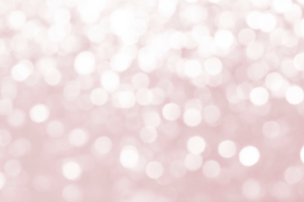 Бесплатное фото Розовый расфокусированный блестящий фон дизайн