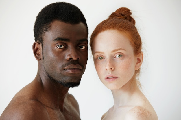 Free photo portrait of happy loving interracial couple