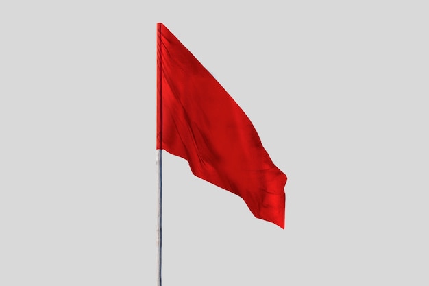 Бесплатное фото Красный флаг развевается