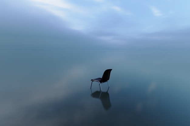 Foto gratuita singola sedia che riflette su una superficie dell'acqua in una giornata tempestosa