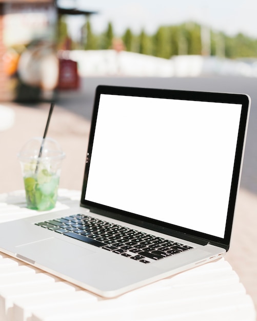 Free photo sideview laptop with copy space
