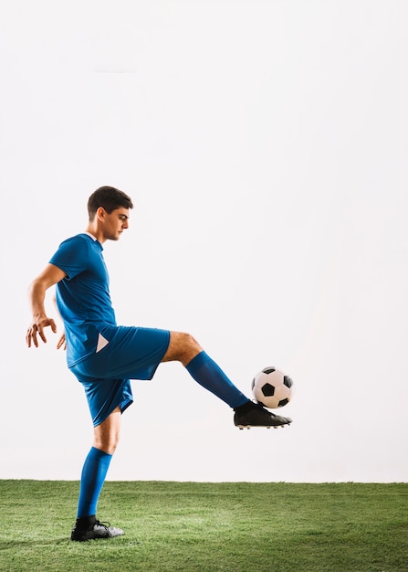 Soccer player balancing ball