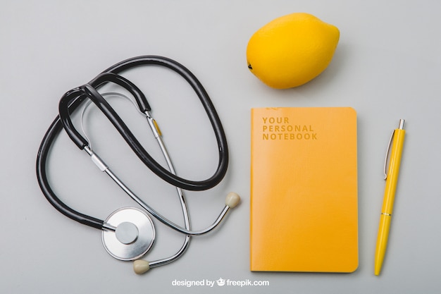 Free PSD composition with notebook, stethoscope and lemmon