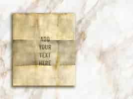 Free PSD editable mock up with grunge style paper on a marble texture