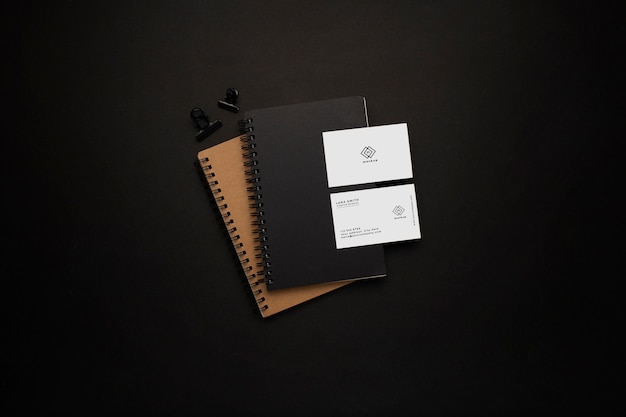 Free PSD notebooks and visit card mockup with black element on black background