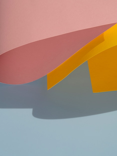 Photo gratuite formes abstraites de papier courbé avec ombre