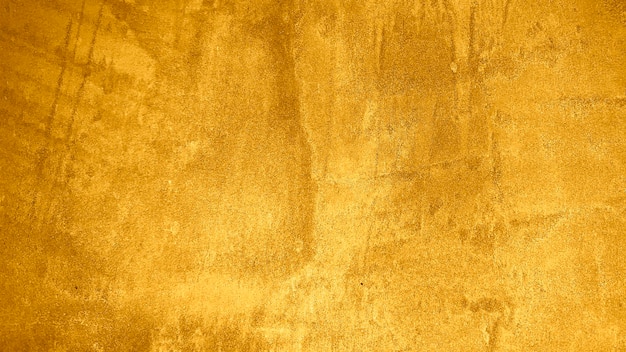 Photo gratuite texture de plâtre décoratif doré ou fond grunge abstrait en béton pour la conception
