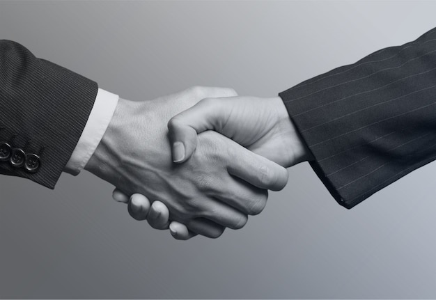 Photo les gens d'affaires se serrant la main lors d'une réunion, photo en noir et blanc