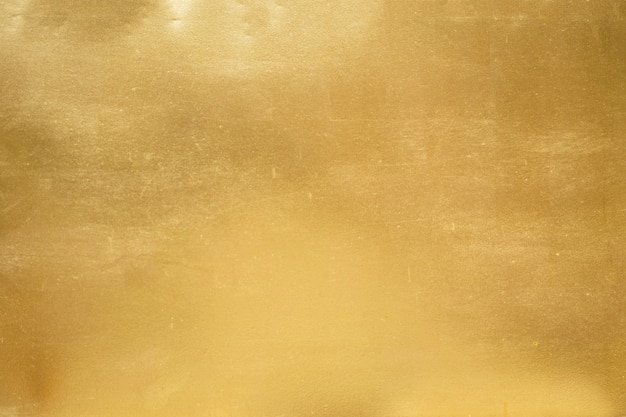 Photo ombre de fond ou de texture et de dégradés d'or.